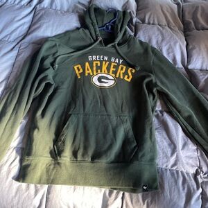 Green Bay Packer’s 47 Brand Dark Green pullover hoodie.